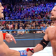 John Cena (left), AJ Styles